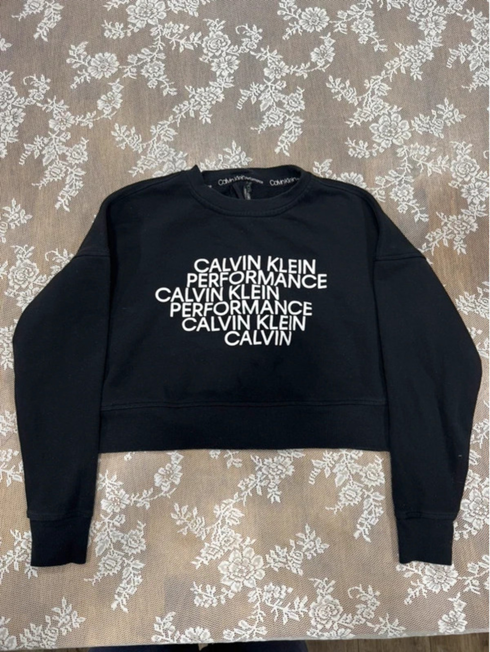 black CK crew neck sweater